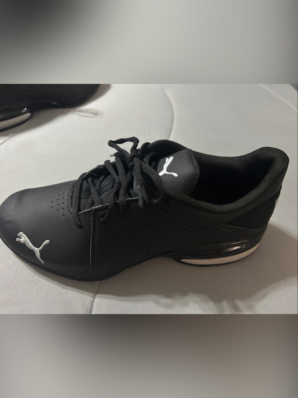 Puma Black Sneakers with White Puma Emblems